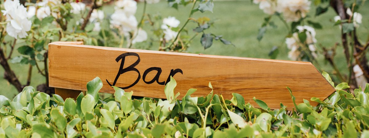 Wooden Garden Sign with "Bar" Handpainted on It as Part Of Tabula Rasa's Event & Wedding Ceremony and Reception Facilities.